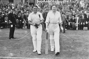 1930 England vs Australia 3rd Test Match L - R, Maurice Tate (1895 - 1956) and Percy Chapman (1900 - 1961) of England walk out to bat against Australia during the 1st innings of the 3rd Test match of the England versus Australia Ashes series on 14th July 1930 at the Headingley Cricket Ground in Headingley, Leeds, England. The match was drawn. (Photo by Central Press/Hulton Archive/Getty Images)