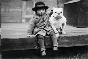 Best Friends 3rd March 1926: George Spinney with his bulldog at the Middlesex Hospital Open Championship Dog Show at Crystal Palace. (Photo by Kirby/Topical Press Agency/Getty Images)