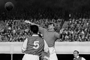 Black and white photograph of George Swindin saving a goal, 1947 Black and white photograph of George Swindin saving a goal, 1947