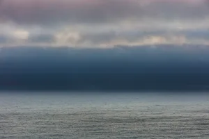 Lifting clouds and fog over the Pacific Ocean, dusk, Oswald West State Park, Oregon Lifting clouds and fog over the Pacific Ocean, dusk, Oswald West State Park, Oregon