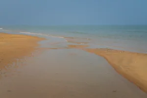 Yantai Golden Beach Coastal Park on the shore of Bohai Bay in the Yellow Sea, Yantai, Shandong, China Yantai Golden Beach Coastal Park on the shore of Bohai Bay in the Yellow Sea on a sunny summer day, Yantai, Shandong, China