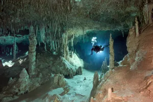 Mexico, Yucatan, Tulum, cave diver in the system Tux Kubaxa Mexico, Yucatan, Tulum, cave diver in the system Tux Kubaxa