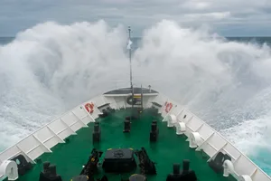Wave breaking over ship bow as we go thru the Drake Passage Wave breaking over a ship in Drake Passage