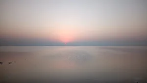 Sunset at the Great Rann of Kutch-Gujarat Sunset at the Great Rann of Kutch,Gujarat. Great Rann of Kutch is a sesonal salt marsh located in the Thar desert in Kutch,Gujarat-India.It is about 7,505 sq kms, and is consdered as one of the largest salt deserts in the world. It remains underwater during monsoon and the rest of the months it remains like a white desert that stretches towards infinity. The amazing view of the white Rann can be seen on a full moon day.