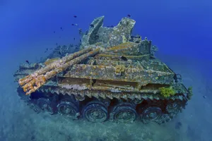 Underwater photo of US American tank M42 Duster with anti-aircraft gun sunk near the shore as an attraction for underwater sports enthusiasts at dive site Seven Sisters, Red Sea, Gulf of Aqaba, Aqaba, Aqaba, Jordan, Asia Underwater photo of US American tank M42 Duster with anti-aircraft gun, Red Sea, Gulf of Aqaba, Aqaba, Jordan.