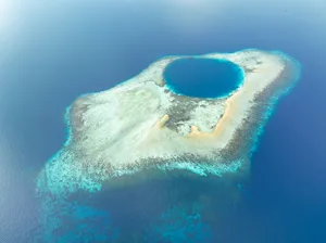 Aerial View of a Beautiful Atoll Near Ternate, Halmahera An atoll near the island of Ternate in Indonesia. Credit: Velvetfish/Getty Images
