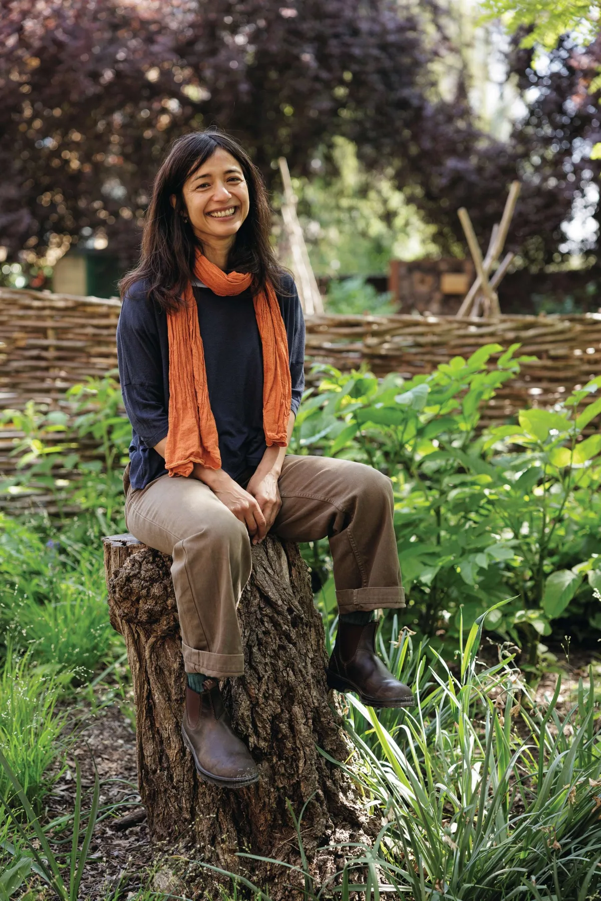 Woman sat in garden