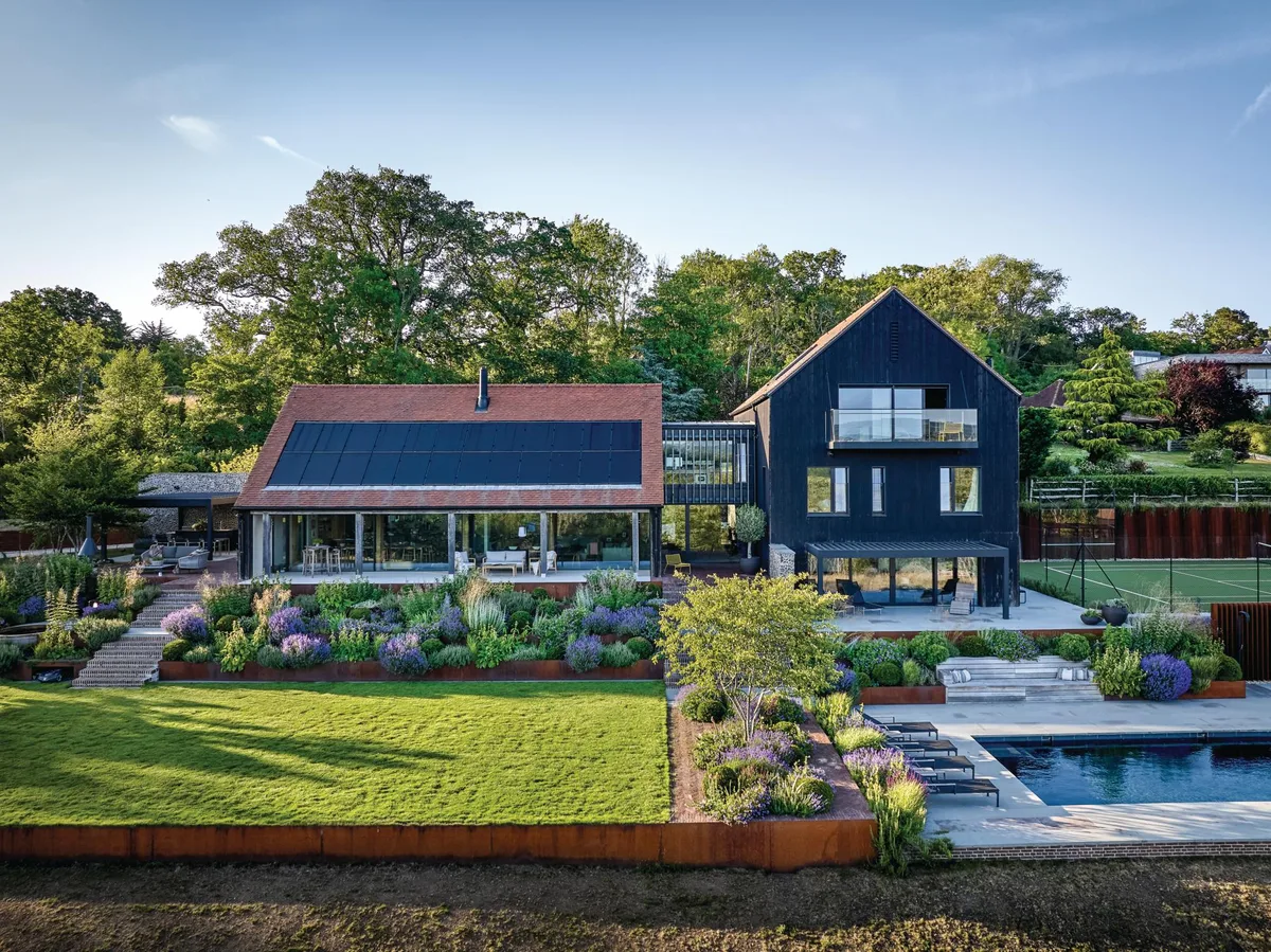 A house with black front and garden