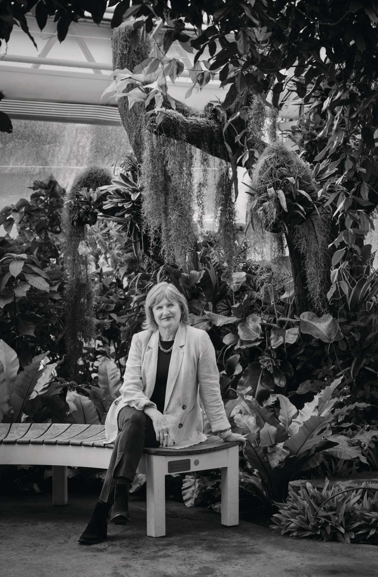 Woman sat in garden
