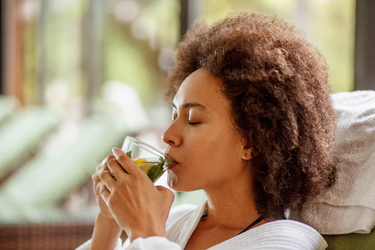 Woman drinking herb tea