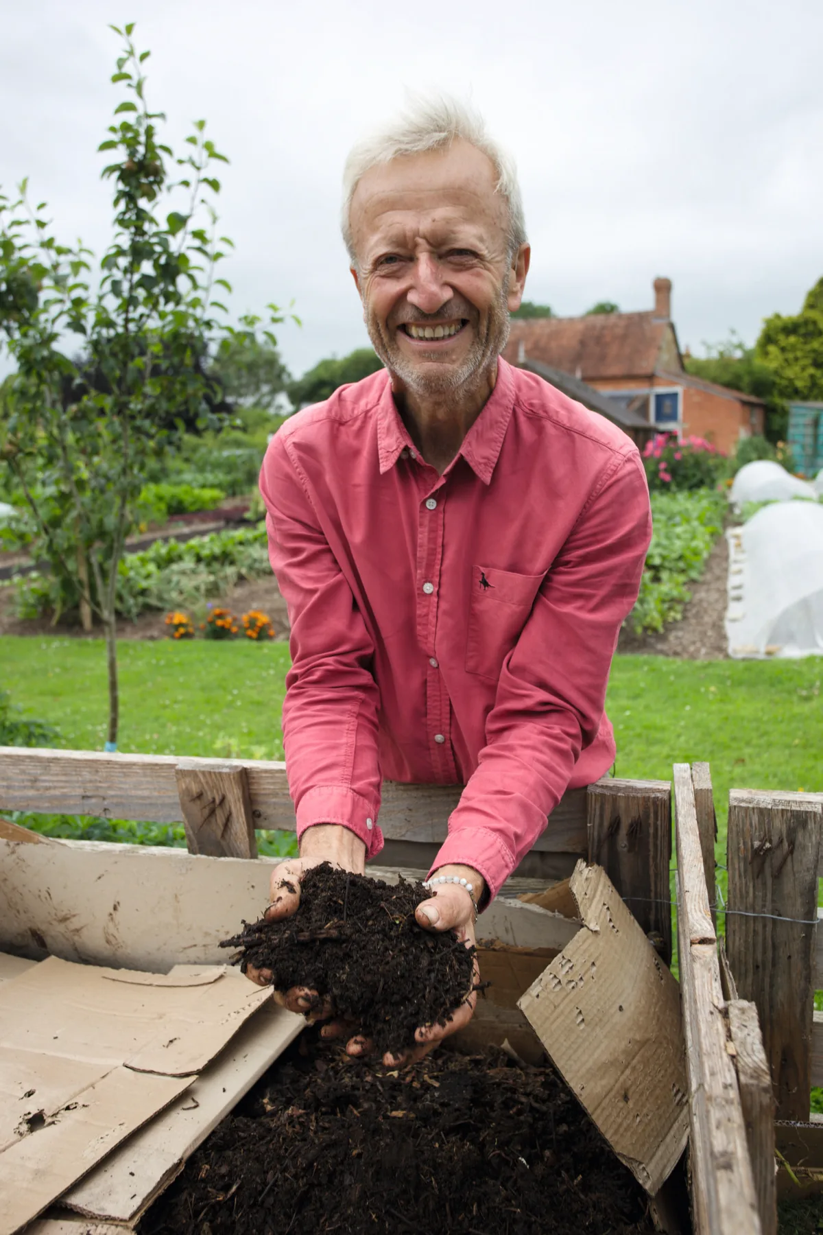 Compost makes you happy: Charles Dowding with his compost heap