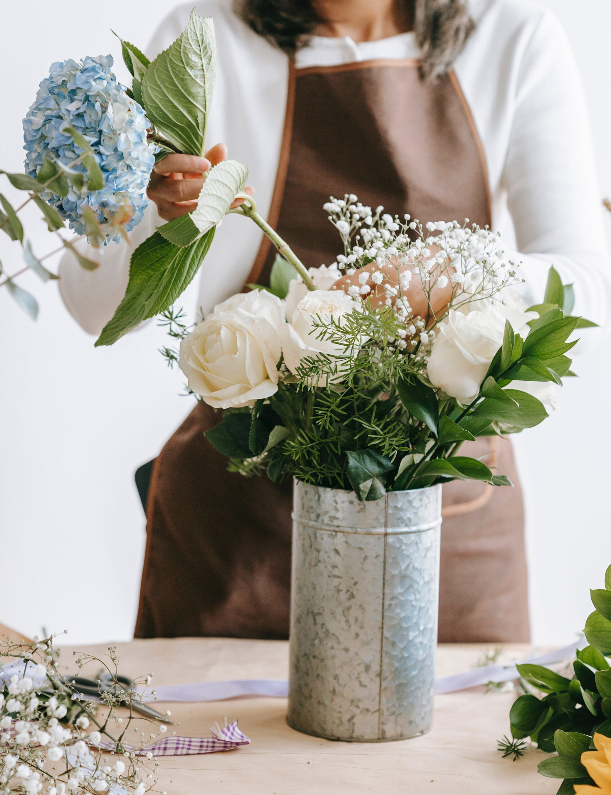 Woman making floral display