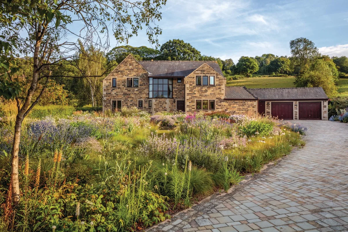 A house with a meadow garden