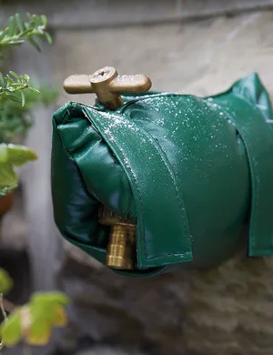 Outside Tap Cover Green PVC Outside Tap Cover Green PVC on a tap