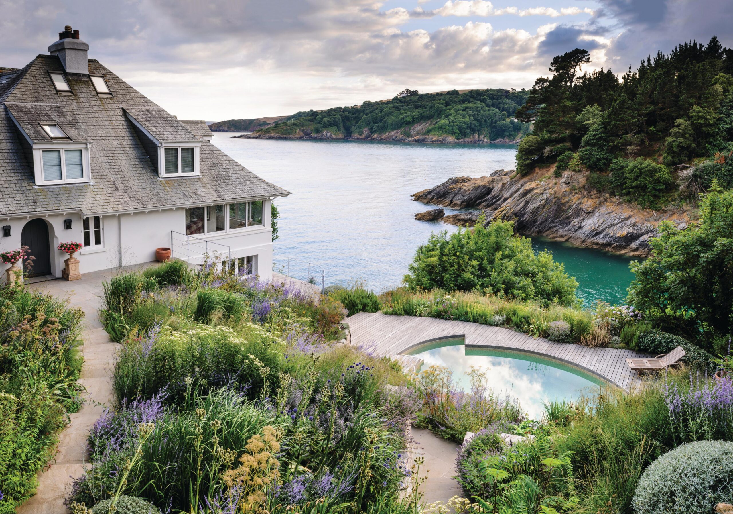 Perched high on the headland, the garden offers spectacular views across the bay. Here garden designer and maker Duncan Nuttall, along with his colleague Will Cumberlidge, have created a space that is sympathetic to this special position. 
