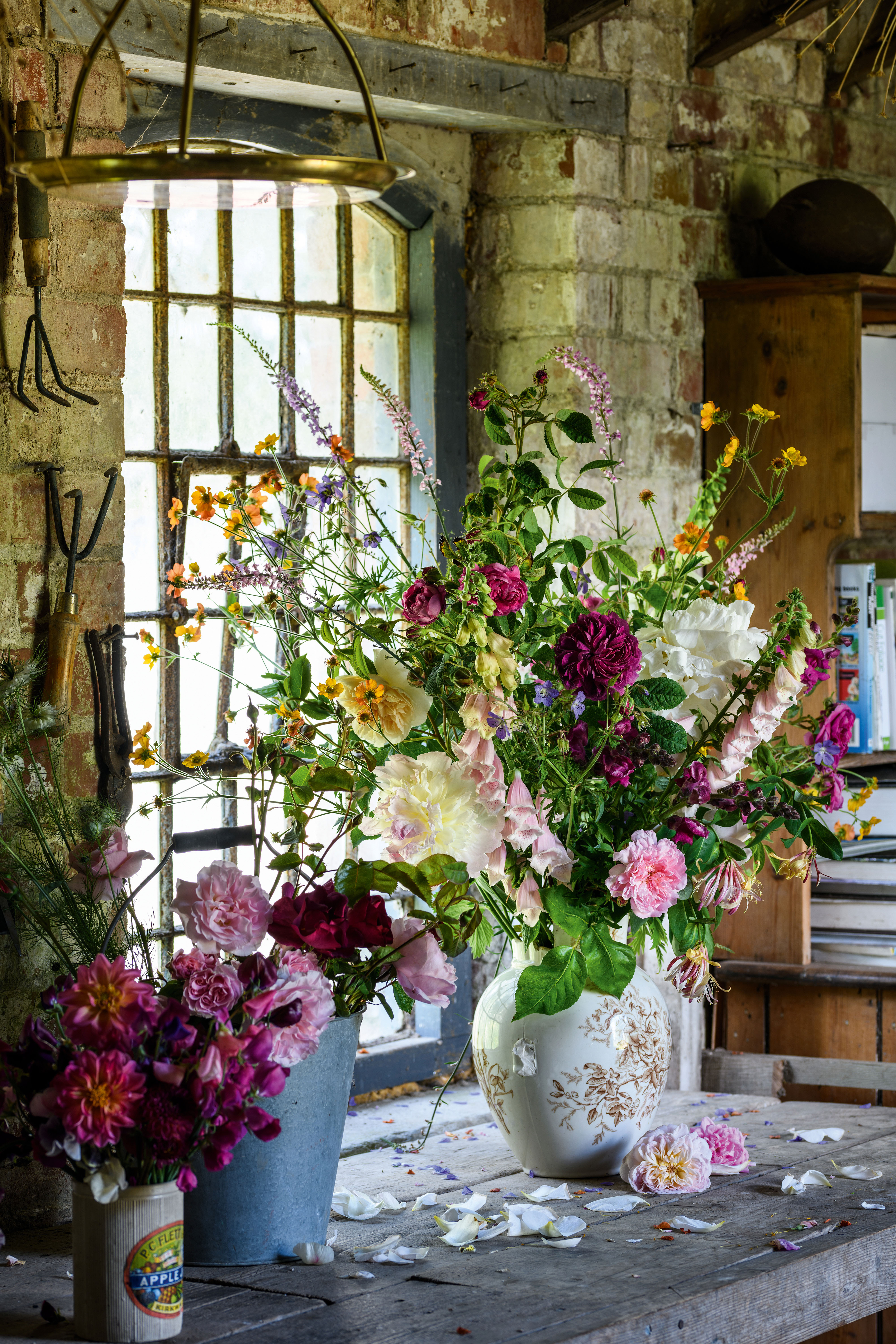 Vase of cut flowers in the work shed