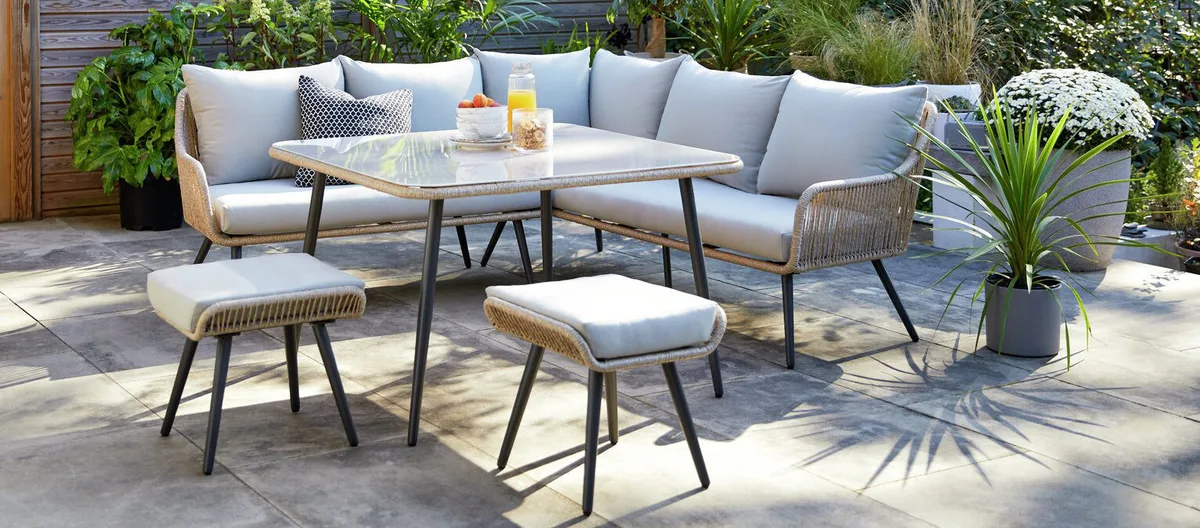 Habitat Malta 6 Seater Steel Corner Dining Set on a patio