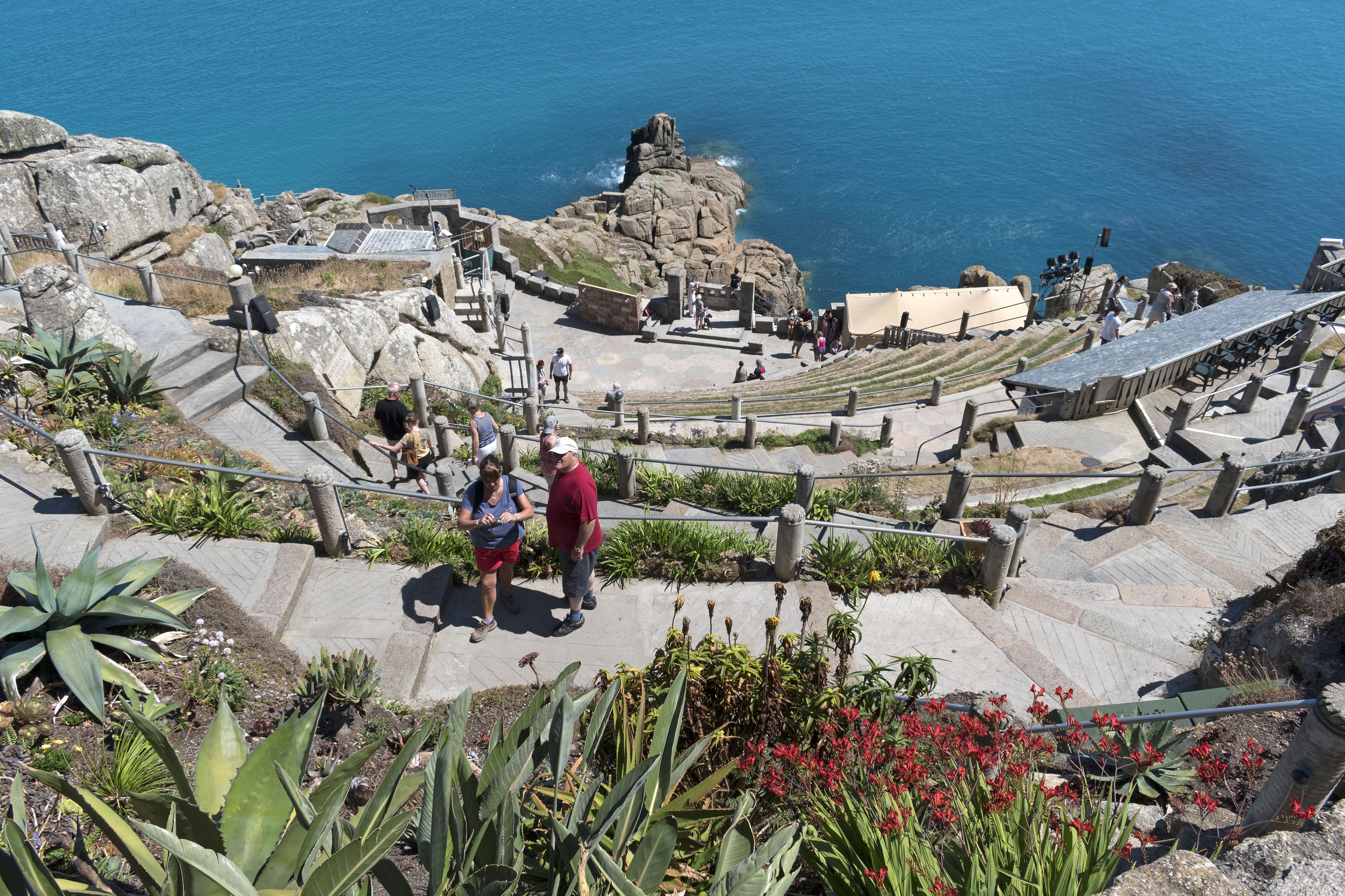 Visitors at the minack an open air theatre near Porthcurno in Cornwall,