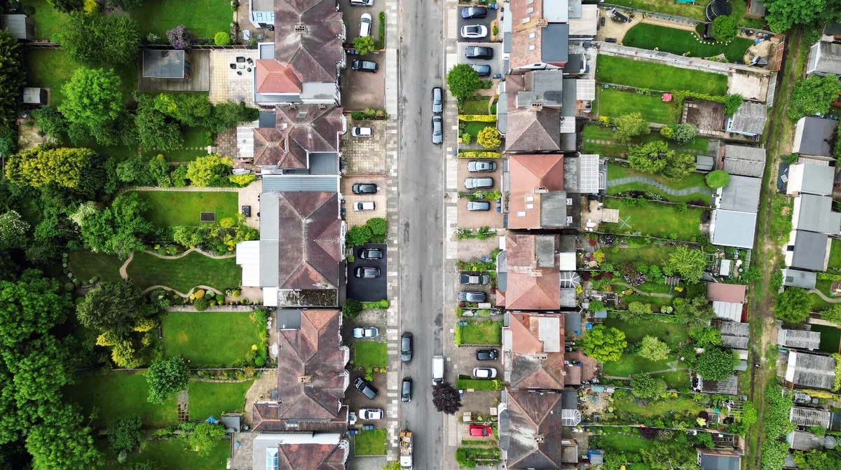 Overhead aerial view of residential homes and street in the UK