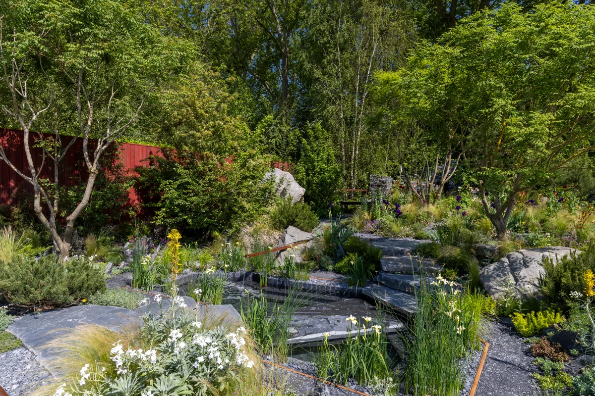 Terrence Higgins Trust Bridge to 2030 Garden at RHS Chelsea Flower Show 2024. Designed by Matthew Childs. Sponsored by Project Giving Back