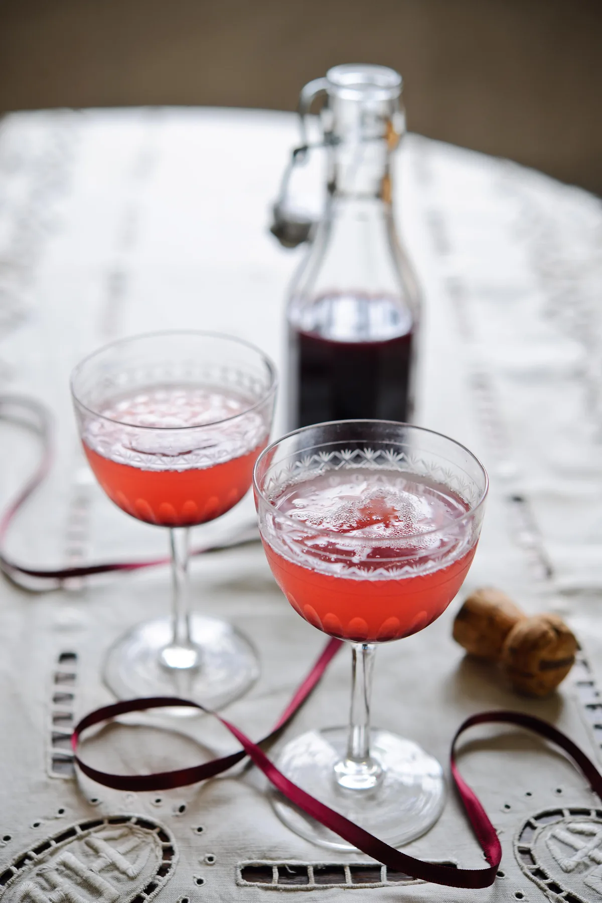 Champagne cocktails with mulled sloe