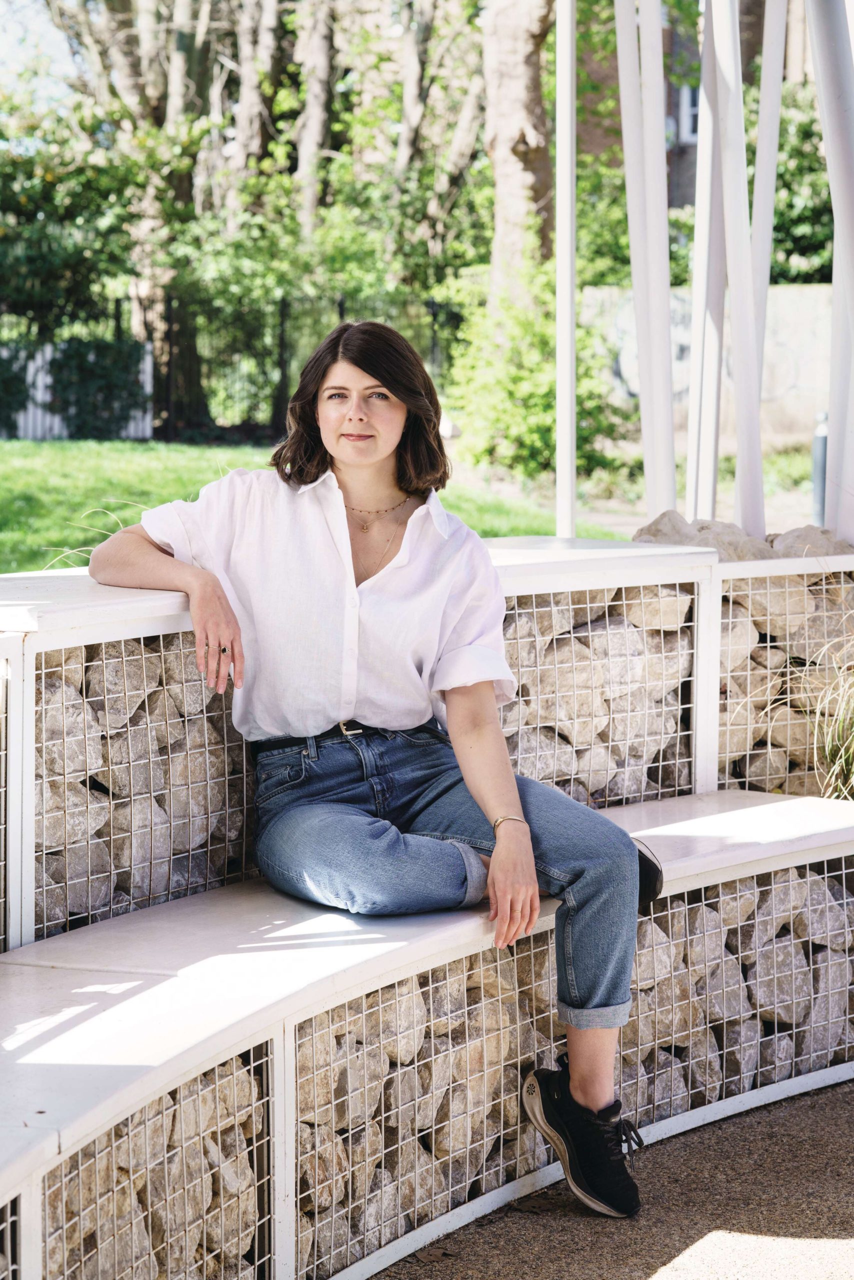 Woman sat in garden