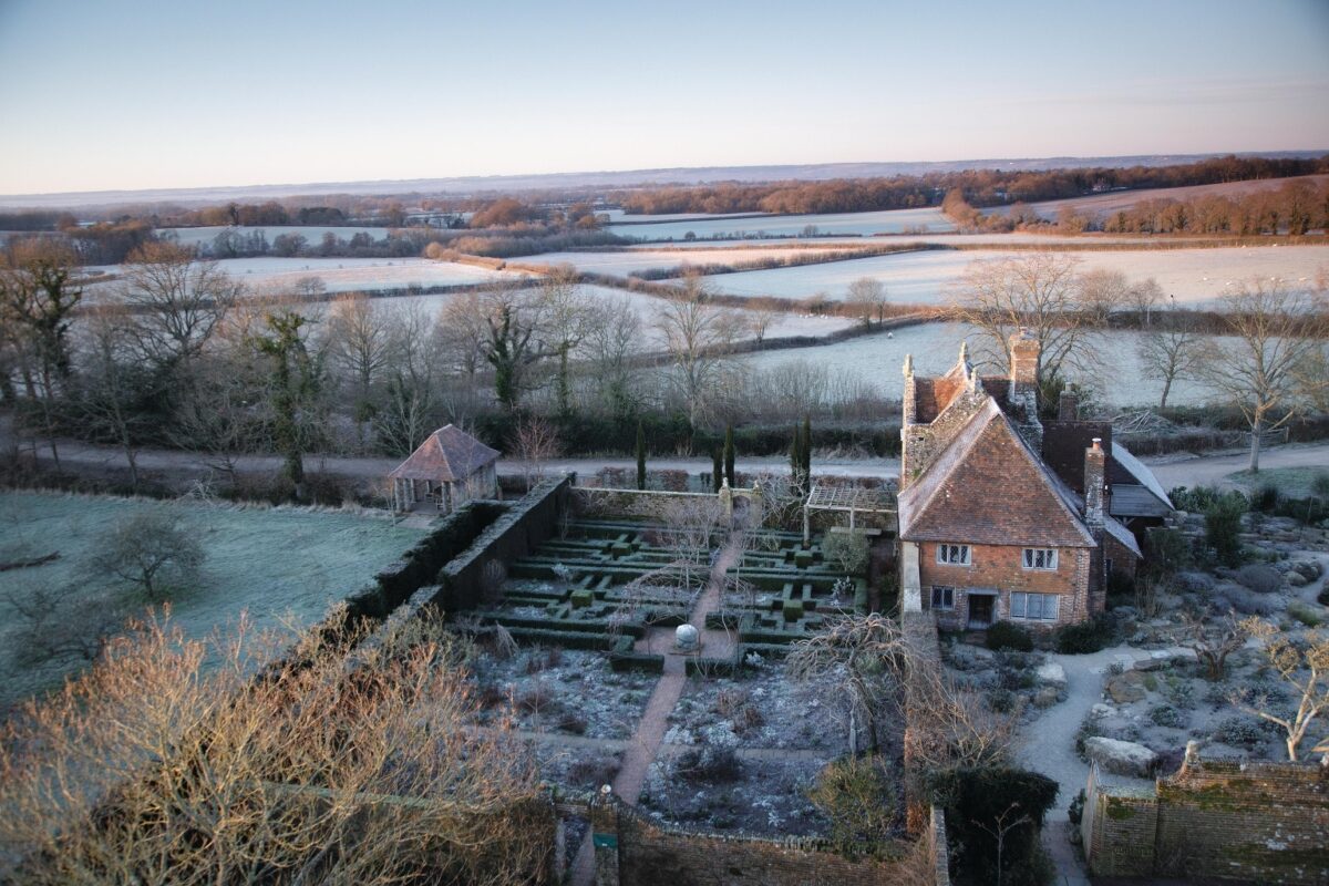 Winter garden and house surrounded by countryside